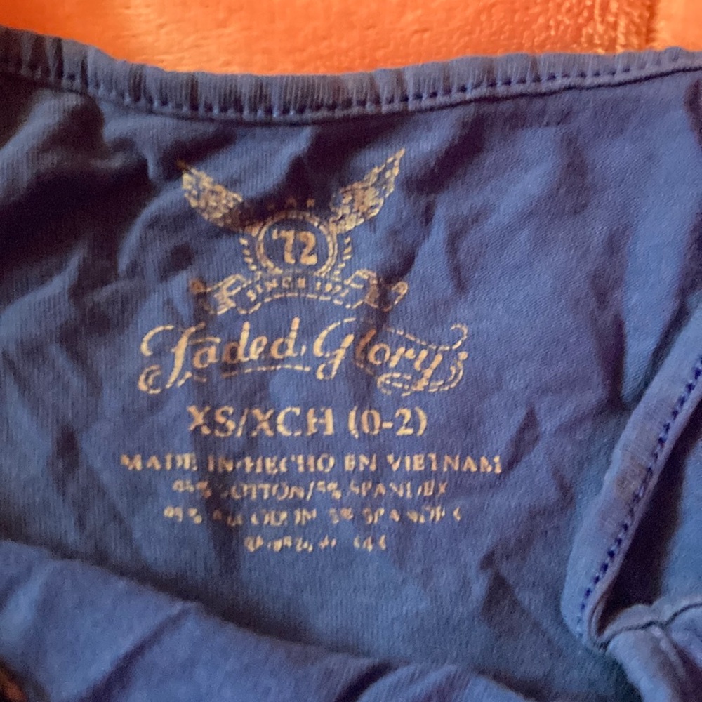 Couple small holes at the bottom of waistline
